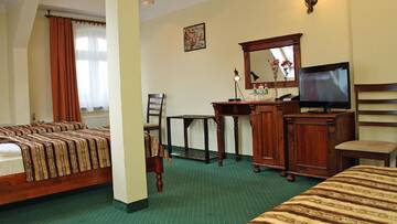 Фото номера Трехместный номер Отель Hotel Aslan г. Тарновске-Гуры 3