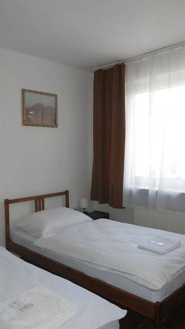 Фото номера Стандартный двухместный номер с 2 отдельными кроватями Отель Hotel Olimpijski г. Тарновске-Гуры 3